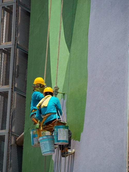 Exterior Man Painting Commercial Building